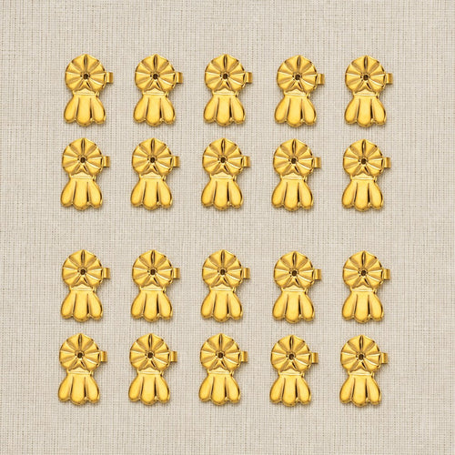 Ten pairs of Auralie lifters, twenty pieces, on linen